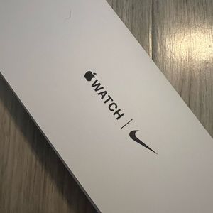 Black Nike Apple Watch Band. Never worn. Box opened. Comes with box
